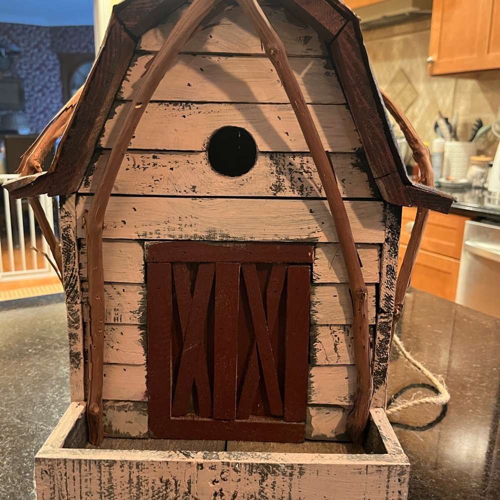 Rustic Wooden Birdhouse with Red Accents